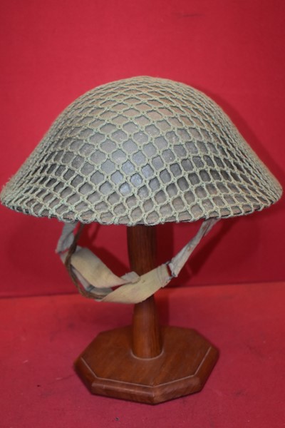 AUSTRALIAN RAW EDGE WW2 ARMY HELMET WITH CAM NETTING COVER